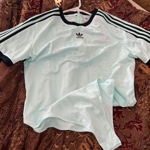 Selling a new adidas bodysuit this is a beautiful bodysuit.